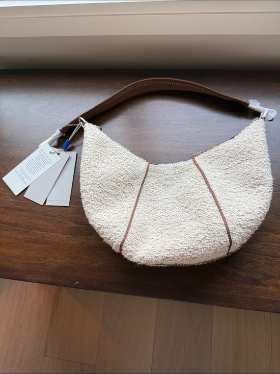 Rothy's Handbags - NWT Rothy's Cream Sherpa Crescent Shoulder Bag with Brown Trim and Strap